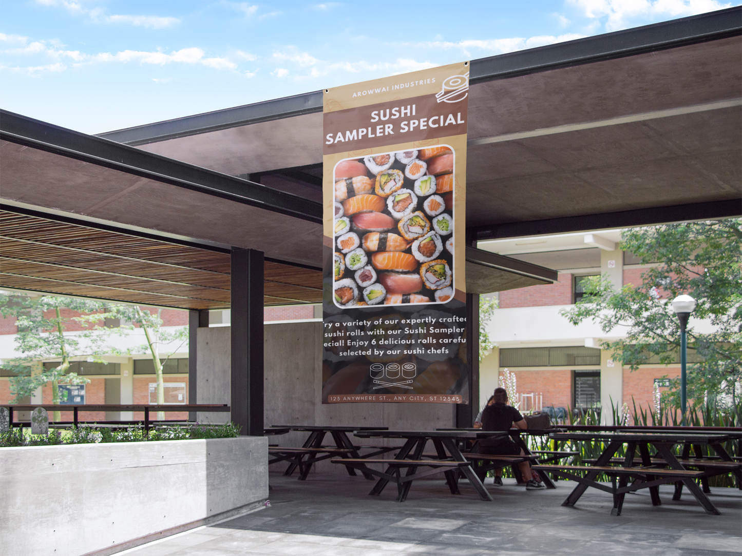 Large outdoor custom vinyl banner promoting a business event, professionally designed by Phoenix Print Shop with premium-quality finishes